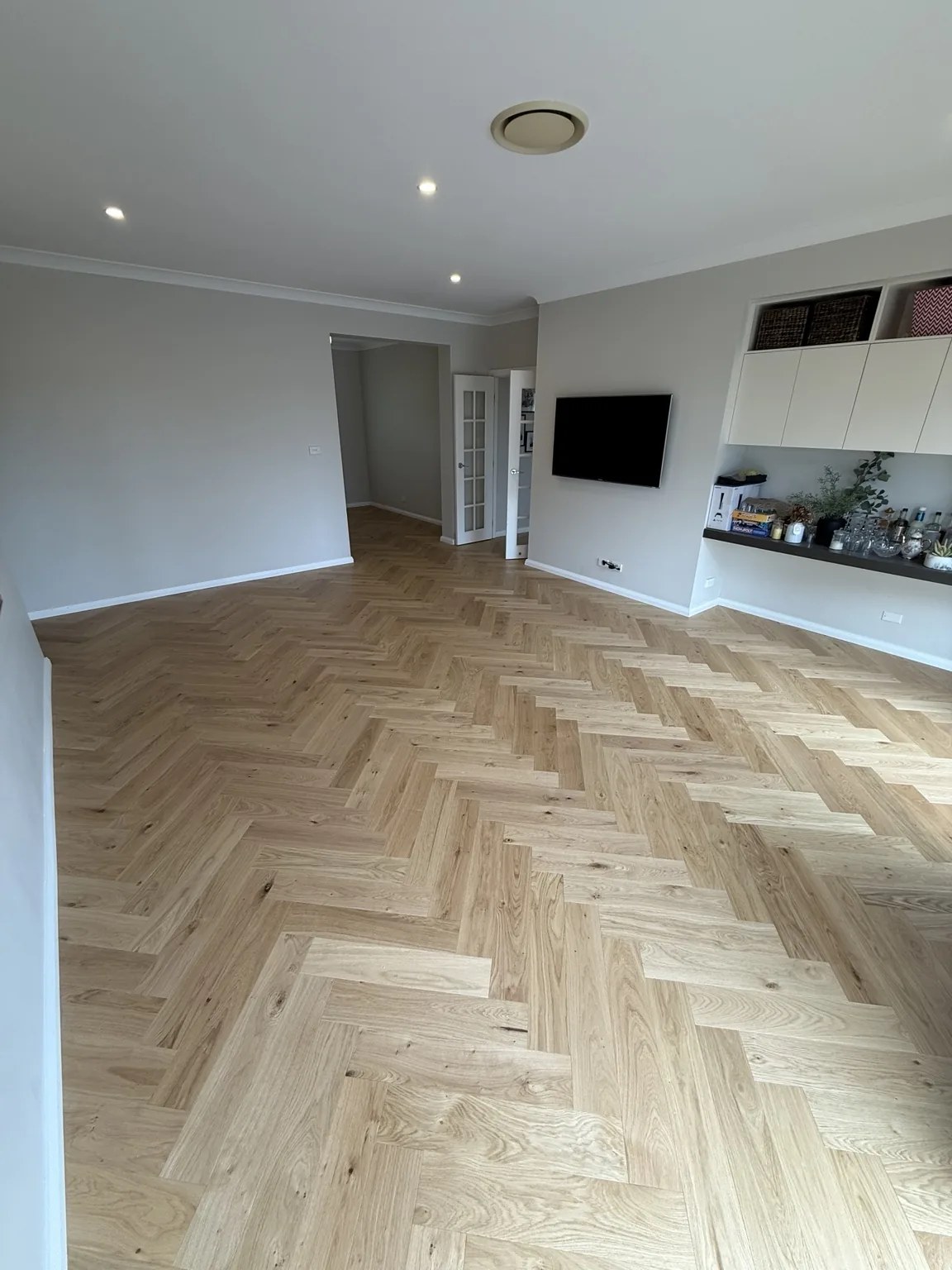 Natural oak herringbone living area
